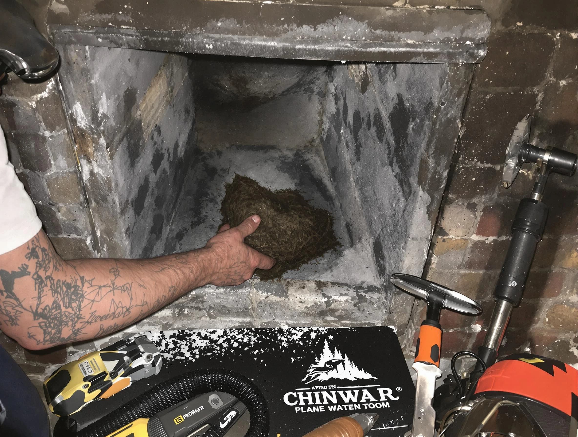 Aurora Chimney Sweep safely removing debris and screening chimney in Aurora, CO